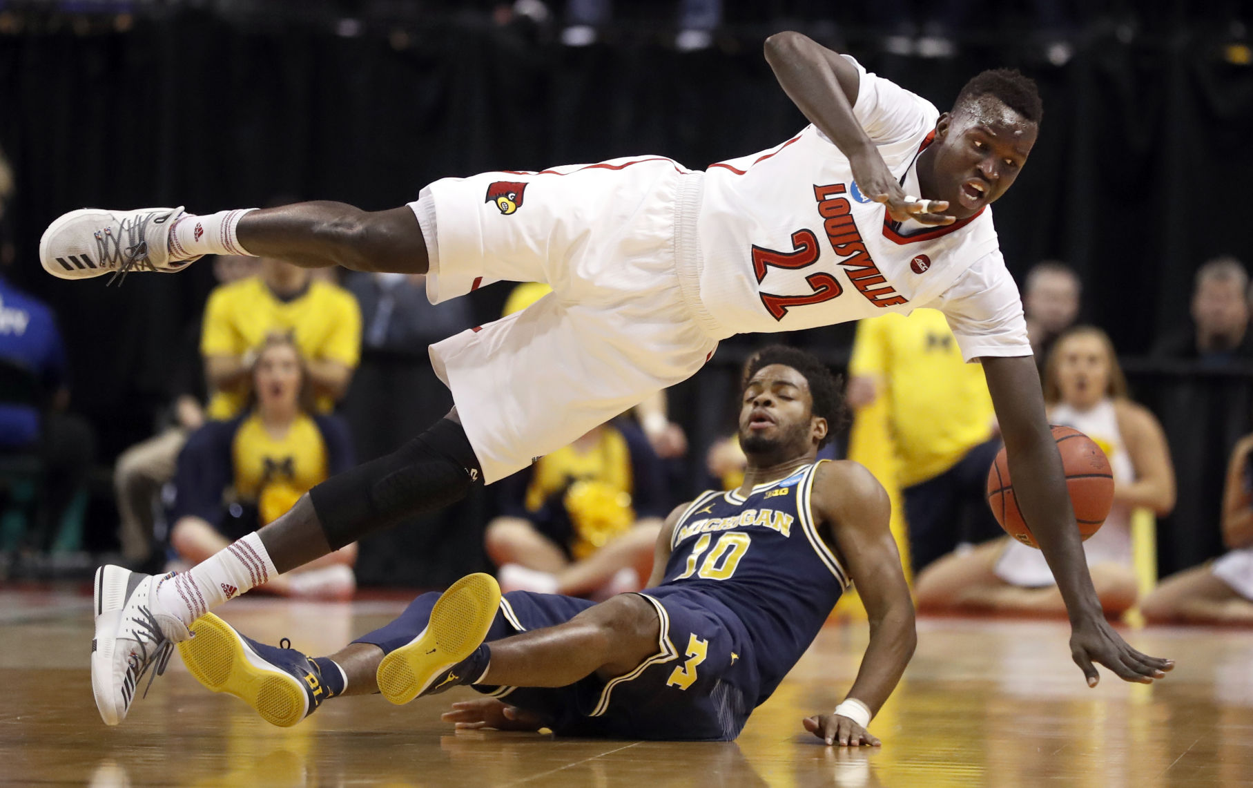 APTOPIX Michigan Louisville Basketball